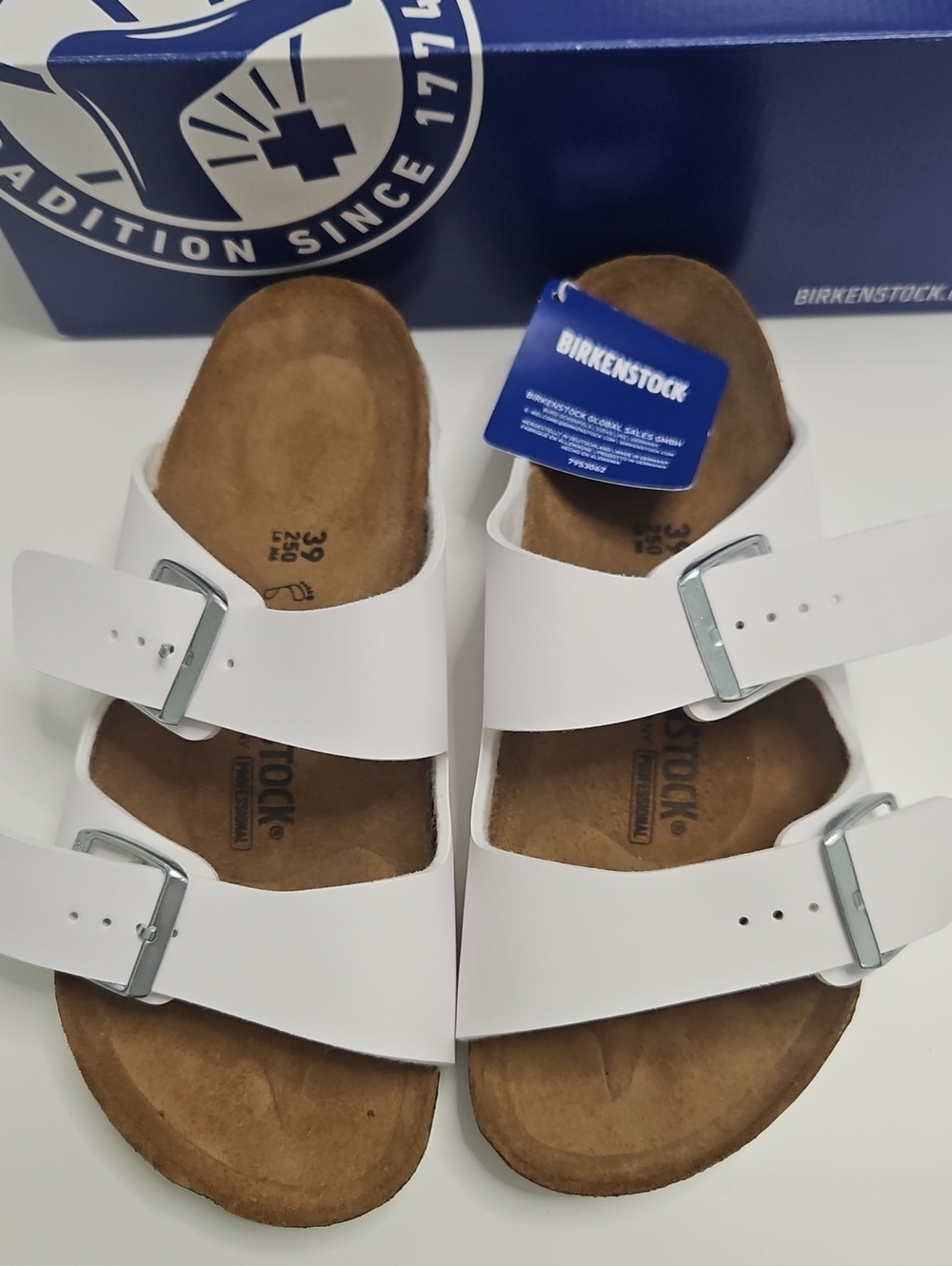 Birkenstock White Arizona Double-Strap Sandals with Silver Buckles